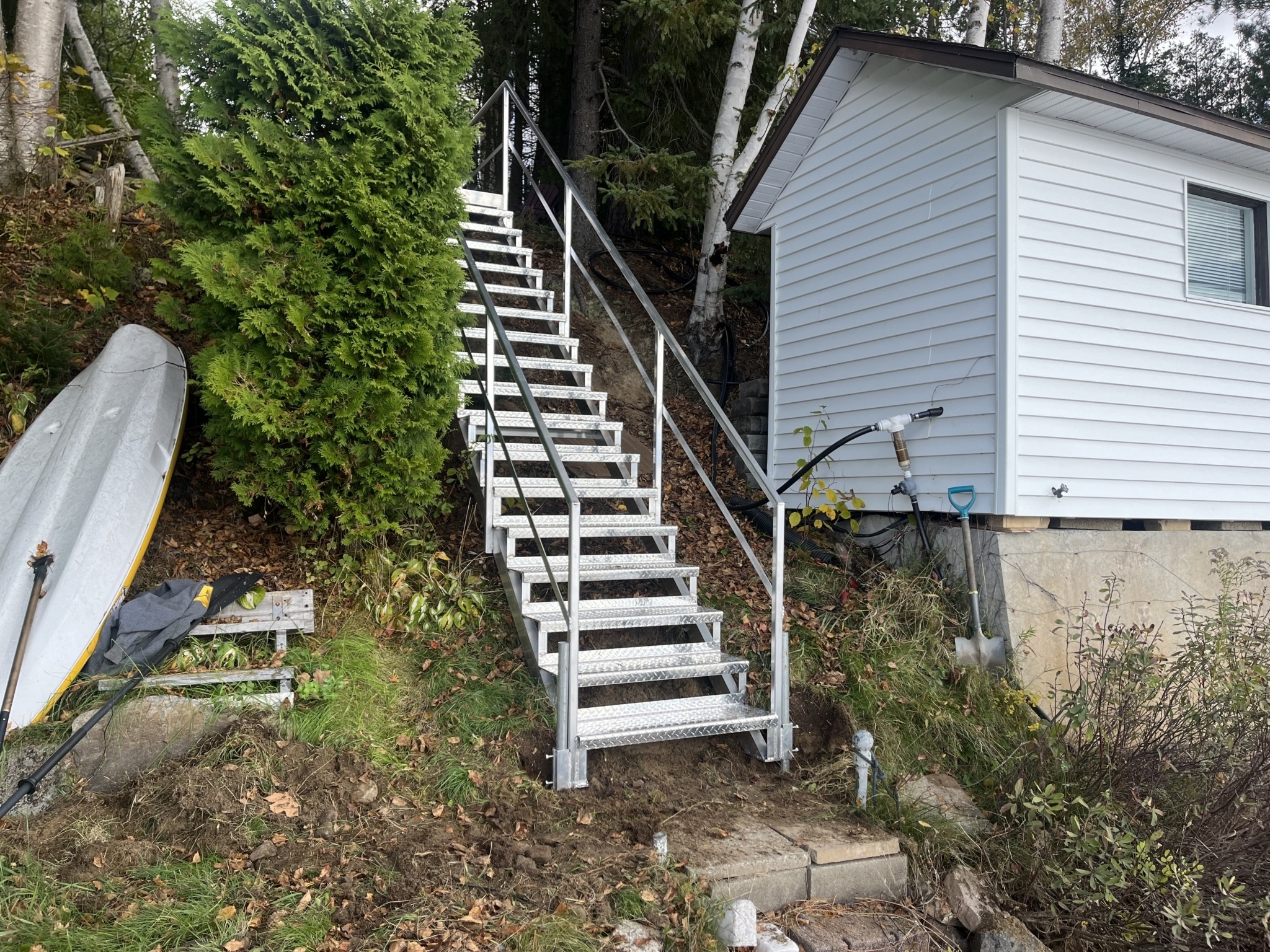 Escalier dans une pente